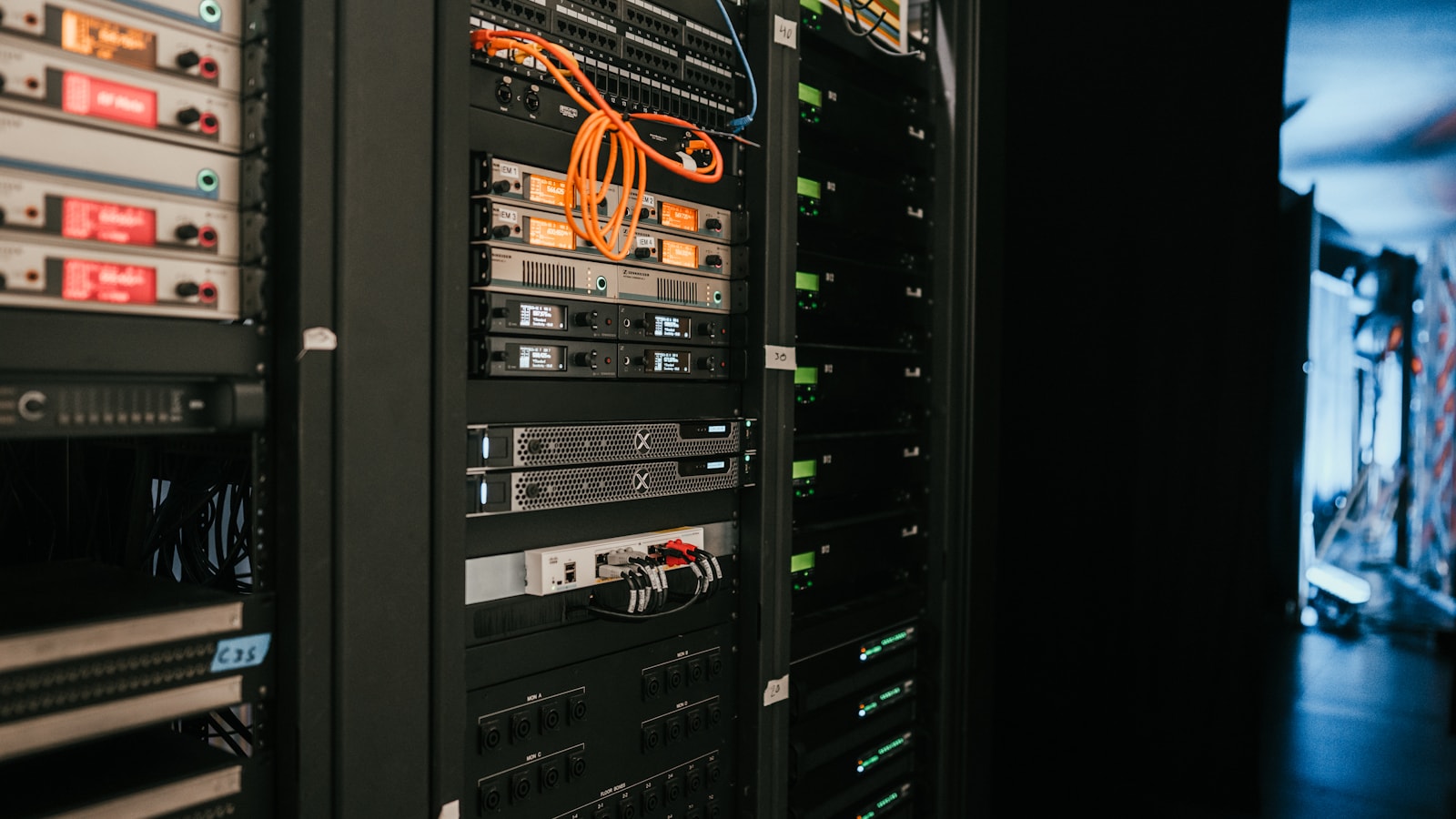 Server rack filled with networking and computing equipment